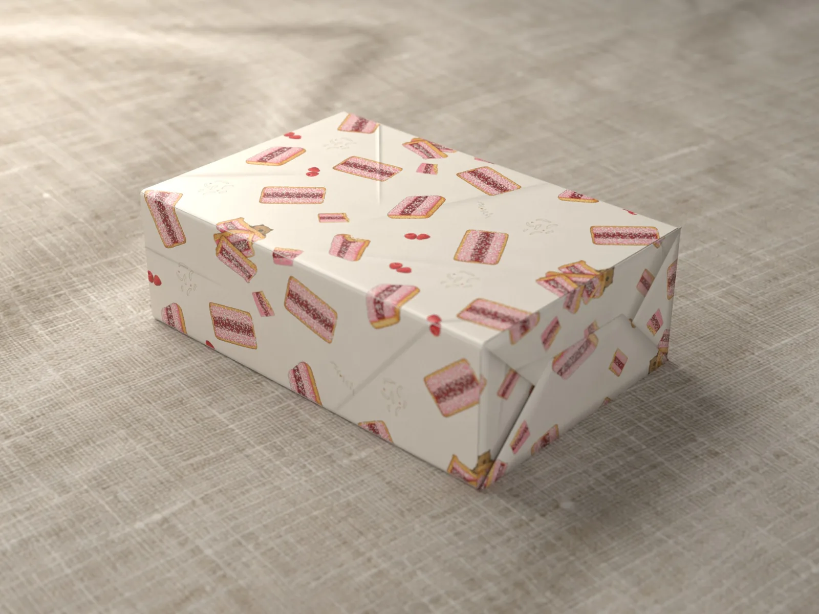 Pink Iced Biscuit Wrap on a wrapped gift